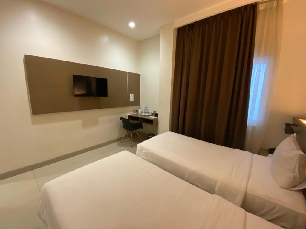 פאלמבאנג Opi Indah Hotel מראה חיצוני תמונה